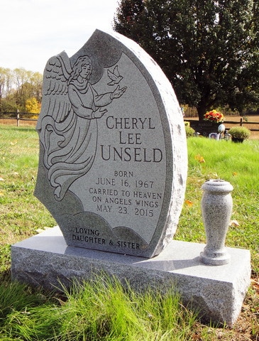 Unseld Unique Shape Monument with Angel Carving and Vase